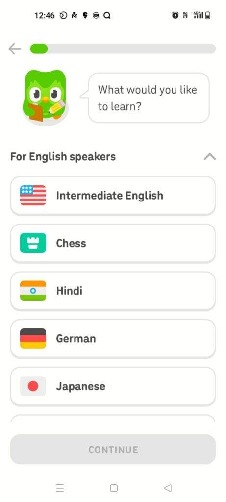 The course onboarding layout of the Duolingo mobile interface with prompt reading 'What would you like to learn?'. A scrollable vertical column under the 'For English speakers' header showcases learning options like 'Intermediate English', 'Chess', 'Hindi', 'German', and 'Japanese' with matching flag icons.